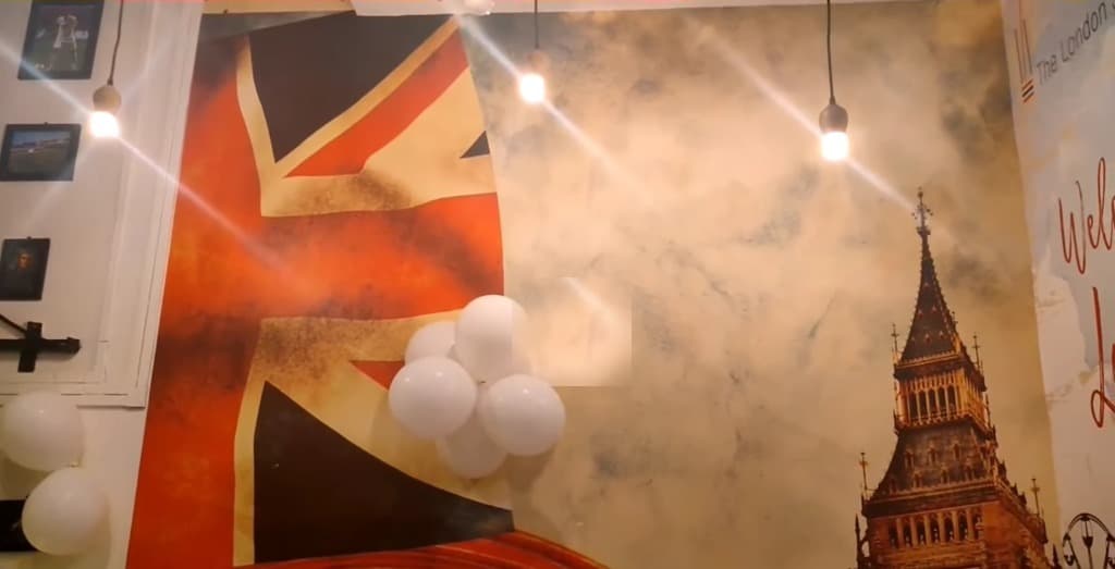 Inside The London Shakes — Union Jack & Big Ben mural wall, Silchar